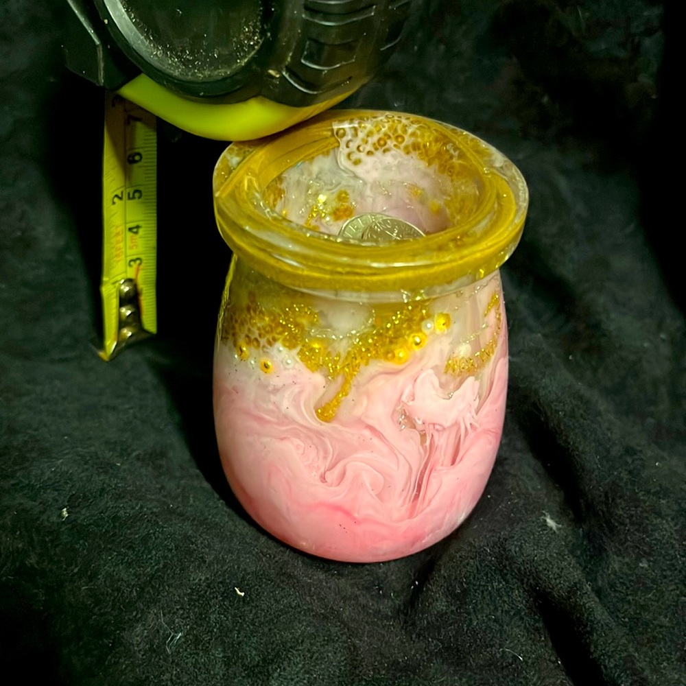 Unique small Resin jar,  where the clutter is the objective
